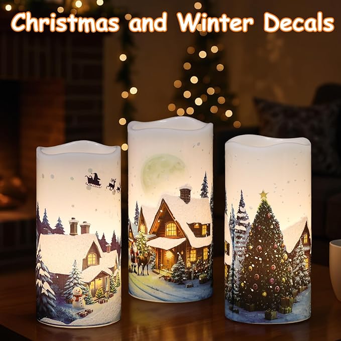 GenSwin Christmas Flameless Candles with Remote Timer, Set of 2 Christmas LED Battery Operated Pillar Candles with Snow House, Santa, Reindeer Decals for Holiday Winter Party Home Decor(D3” x H6”)