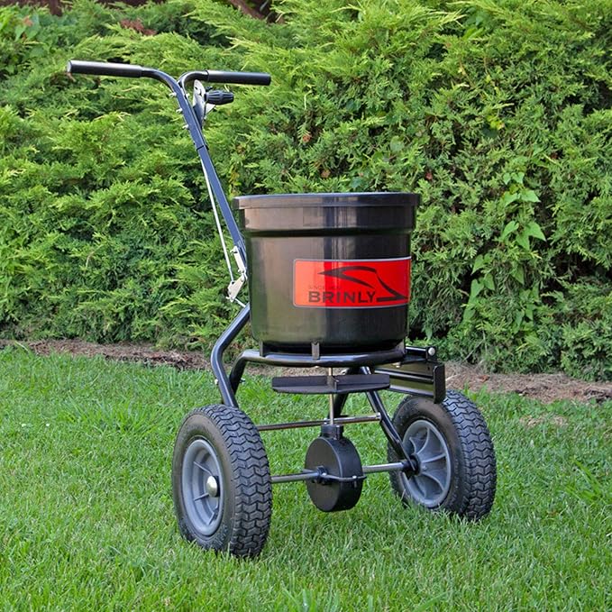 Brinly P20-500BHDF-A Push Spreader with Side Deflector Kit and Hopper Grate, 50 lb. Capacity - Matte Black
