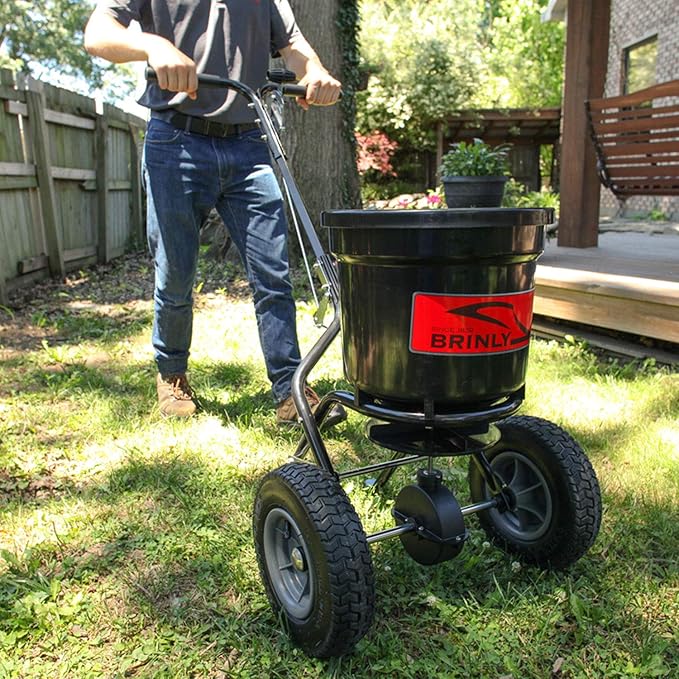 Brinly P20-500BHDF-A Push Spreader with Side Deflector Kit and Hopper Grate, 50 lb. Capacity - Matte Black