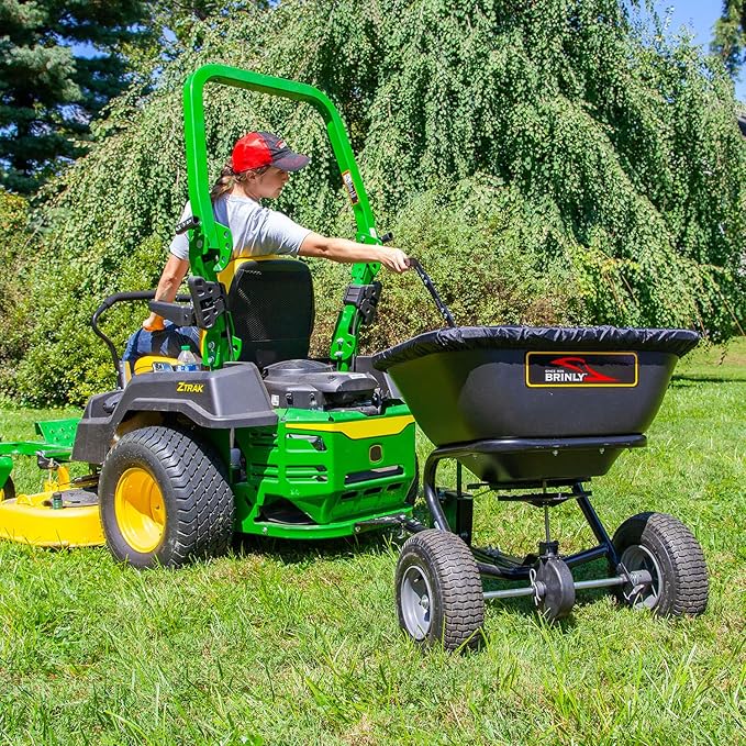 Brinly BS26BH-A Tow Behind Broadcast Spreader with Universal Hitch, 125 lb. - Deluxe Matte Black